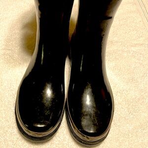Size 6. Black and animal print rain boots